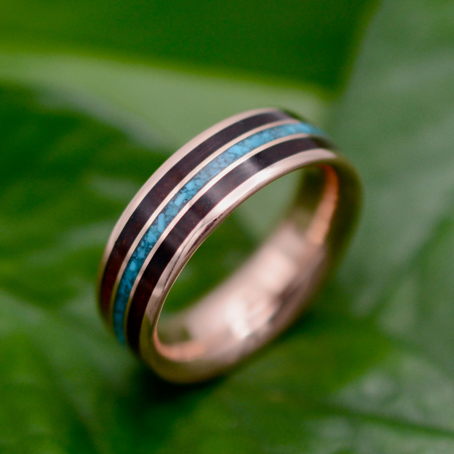 a close up of a ring on a leaf