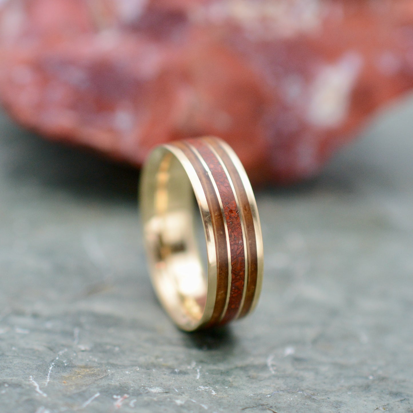 a close up of a ring on a rock