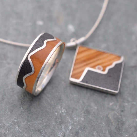 Mountain range necklace with pink abalone and volcanic titanium sand