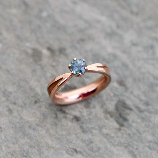 Tapered band detail of rose gold engagement ring with dogwood wood inlay, handcrafted to order