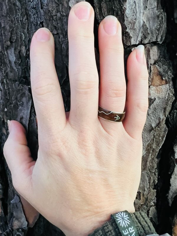 Custom wood wedding band with symbols for nature lover