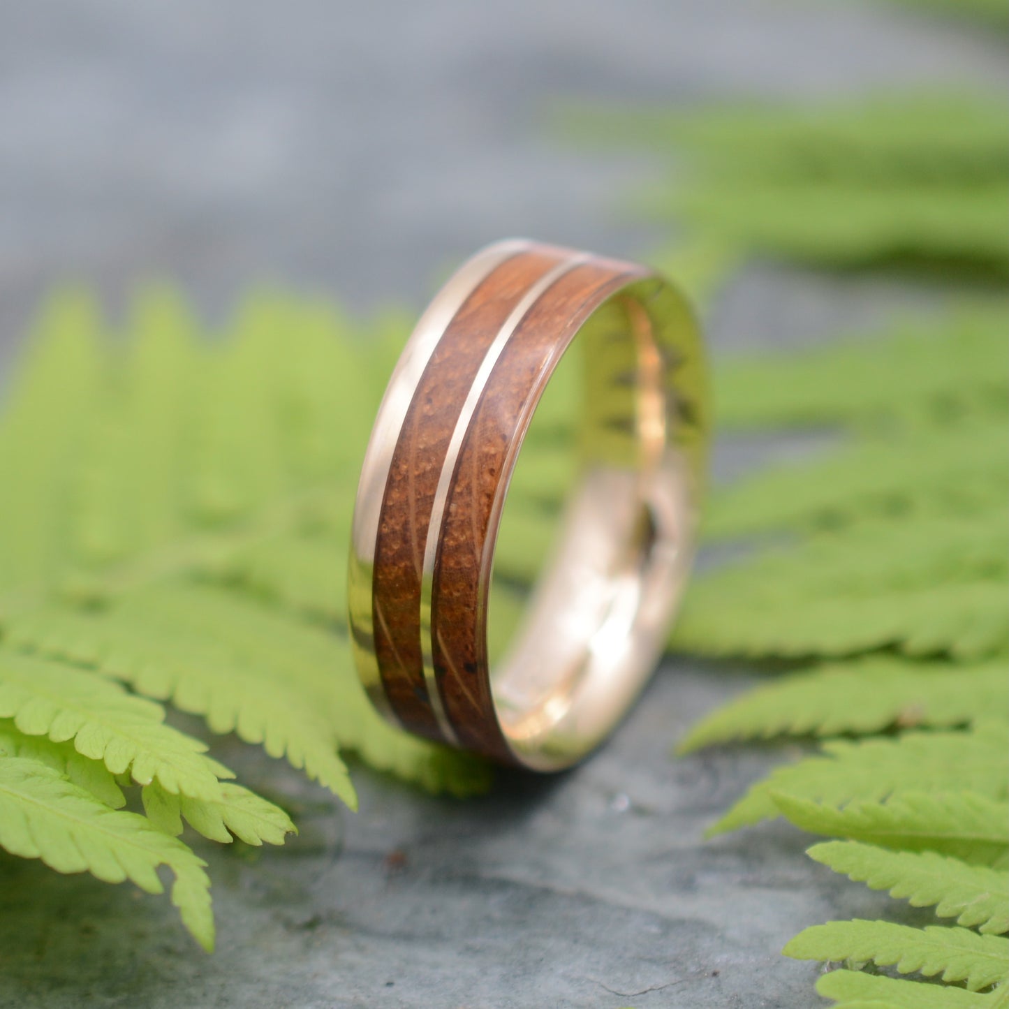 Custom whiskey barrel ring with 14k yellow gold. Made to order in Louisville, Kentucky with reclaimed bourbon barrel staves.
