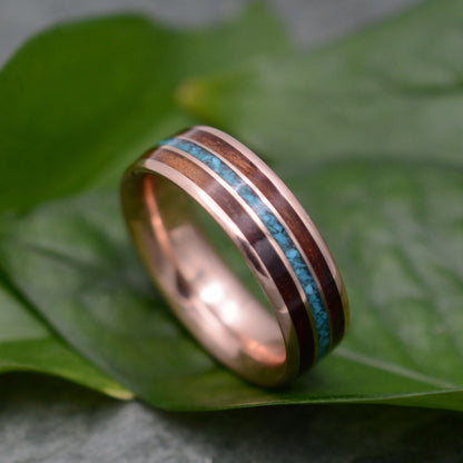 a wedding ring with a blue and brown stripe