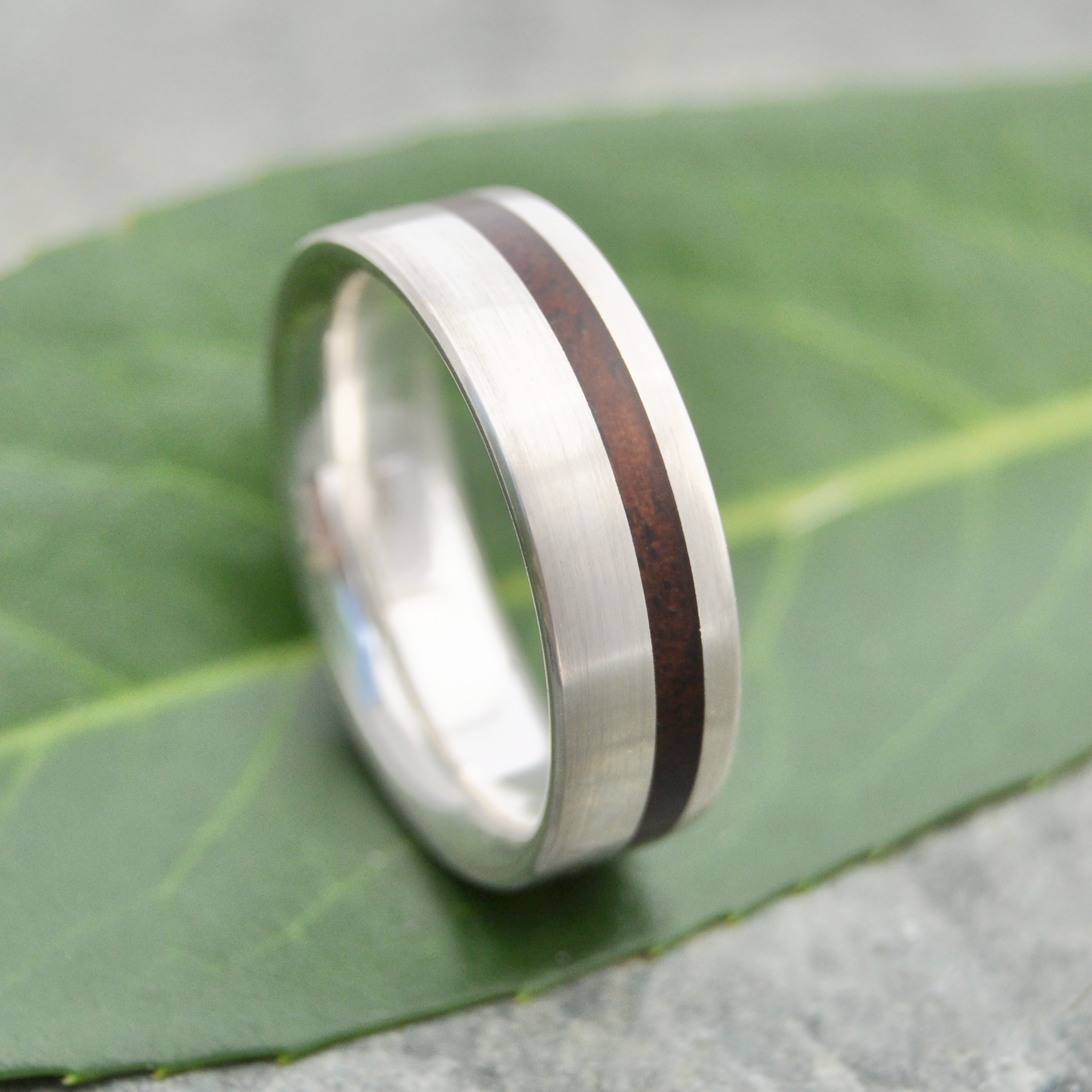 Eco-friendly nacascolo wood wedding band with recycled sterling silver