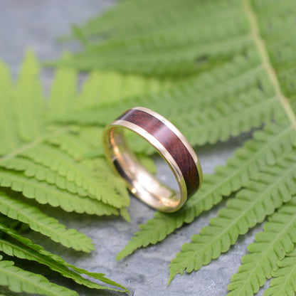 Lados comfort fit wood wedding band with reddish-brown Guapinol and recycled yellow gold