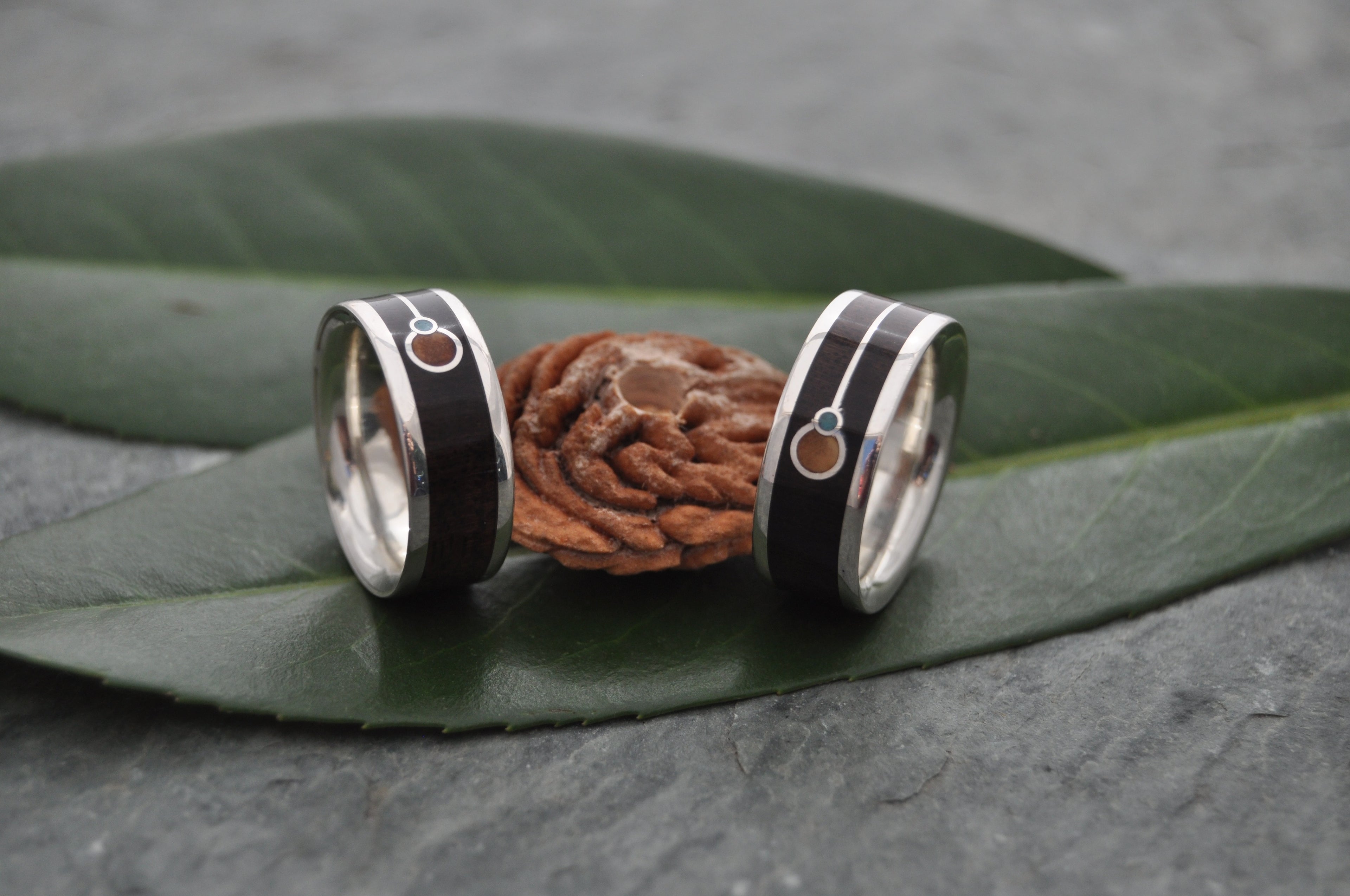 Custom unity symbol wooden ring set handmade with peach pit and turquoise, by Naturaleza Organic Jewelry
