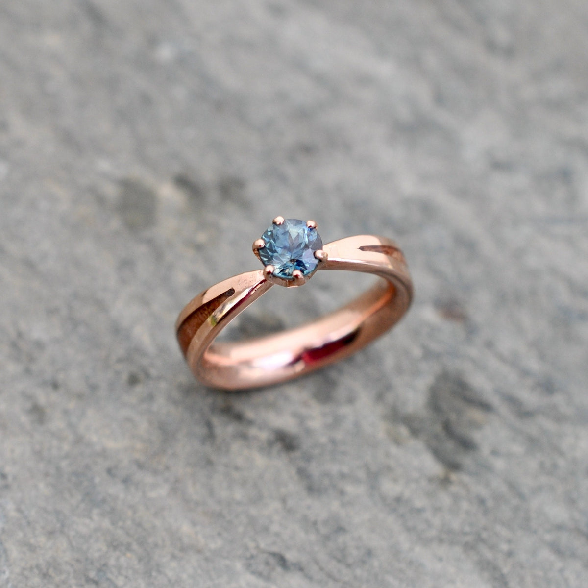 Aquamarine wood engagement ring with Kentucky walnut and recycled rose gold tapered band top view