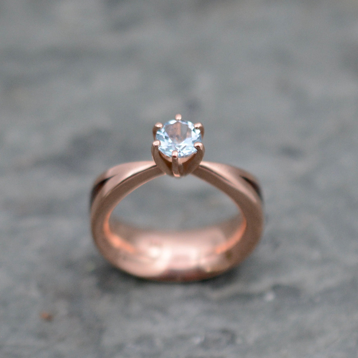 Aquamarine wood engagement ring with Kentucky walnut and recycled rose gold tapered band detail view