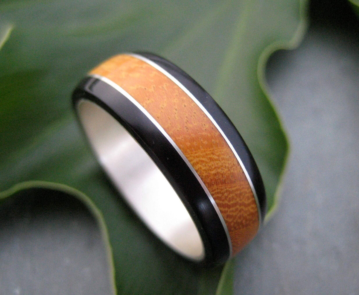 Black coyol and moran wood wedding band with recycled sterling silver