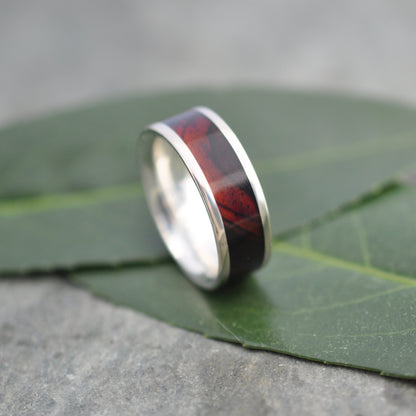 Wood and gold wedding band with cocobolo (ñambaro) wood inlay and recycled gold by Naturaleza Organic Jewelry