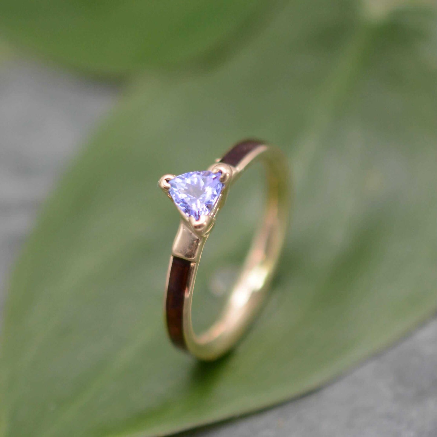 Koa Wood Engagement Ring with Trillion Cut Tanzanite and 14k Yellow Gold - unique wood wedding band handmade in Louisville KY.