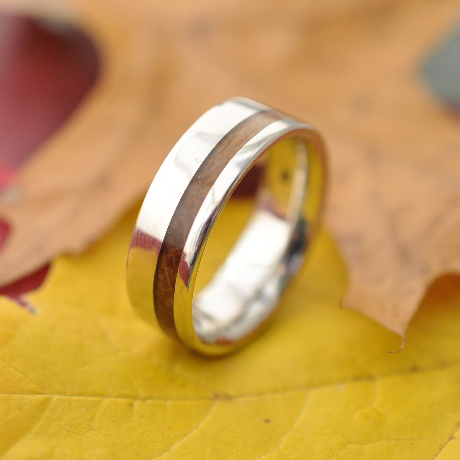Bourbon barrel wedding ring with white gold, fall outdoor photo