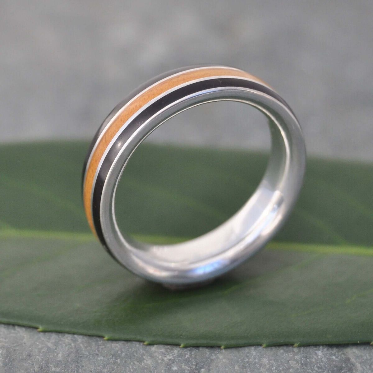 Eco-friendly Juntos design wood ring with recycled sterling silver