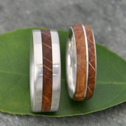 Symmetric bourbon barrel wedding band with sterling silver and white oak