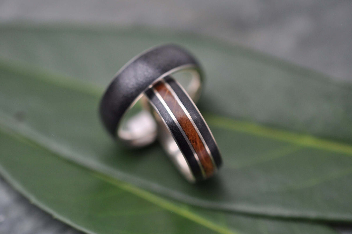 Sterling silver comfort fit ring with volcanic titanium sand inlay