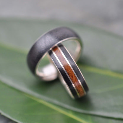 Close-up of volcanic titanium sand inlay in sterling silver ring