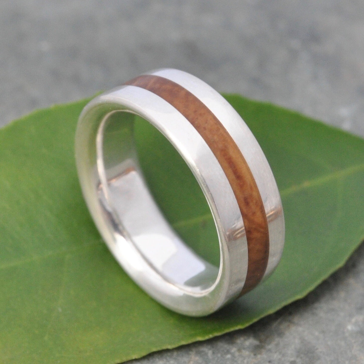 Comfort fit bourbon barrel ring with sterling silver edges
