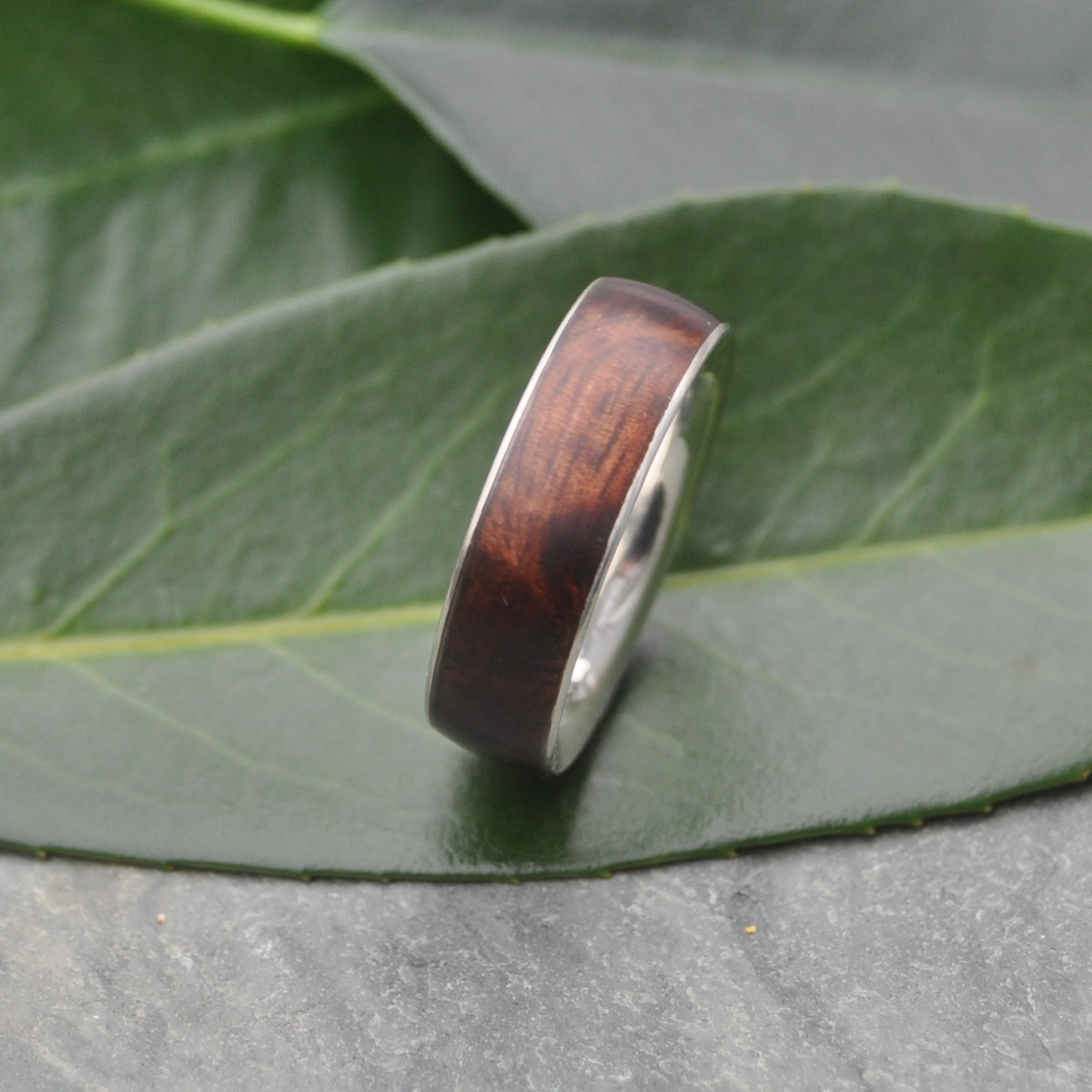 Sustainable koa and silver wedding ring with comfort fit band