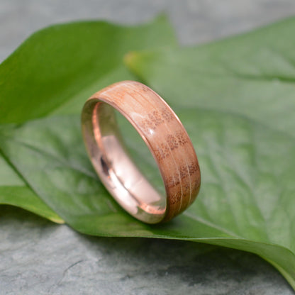 a close up of a ring on a leaf