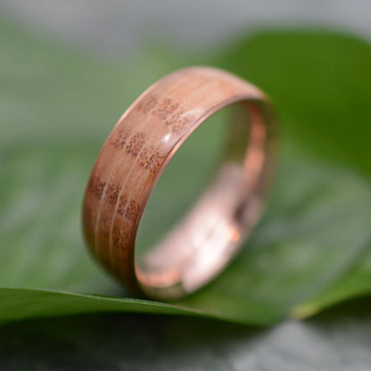 a close up of a ring on a leaf