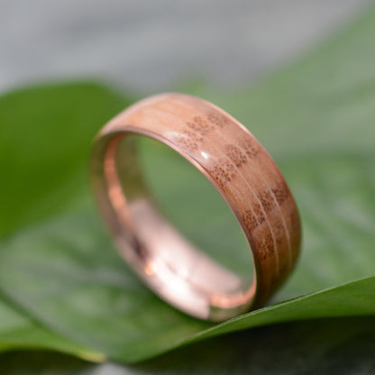 a close up of a ring on a leaf