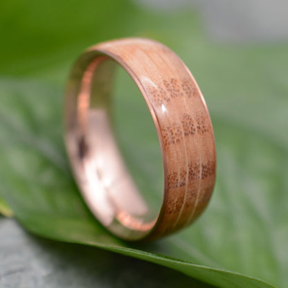 a close up of a ring on a leaf