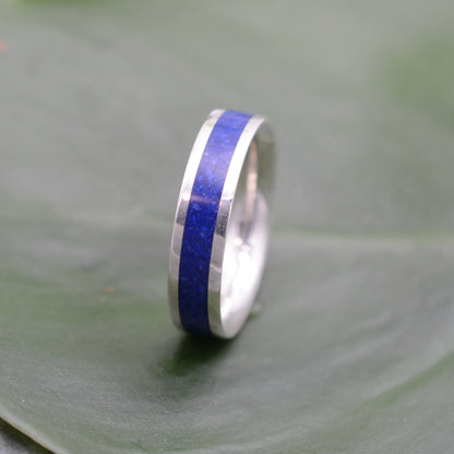 a wedding ring with a blue stripe on it