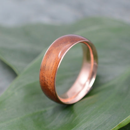 Hawaiian koa wedding band with 14k rose gold 