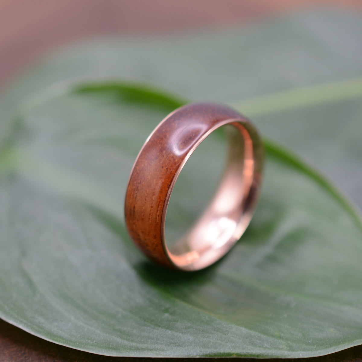 Sustainable wood wedding band with koa wood and rose gold 