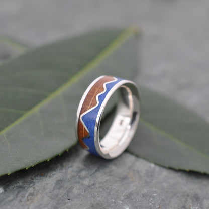Lapis Lazuli Mountain Ring, Bourbon Barrel Wood and Sterling Silver on leaves, showcasing a unique wood wedding ring design.