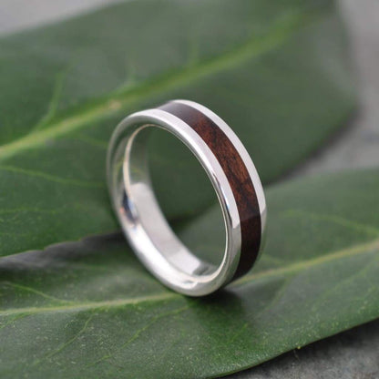 Handcrafted wood and sterling silver wedding band detail view