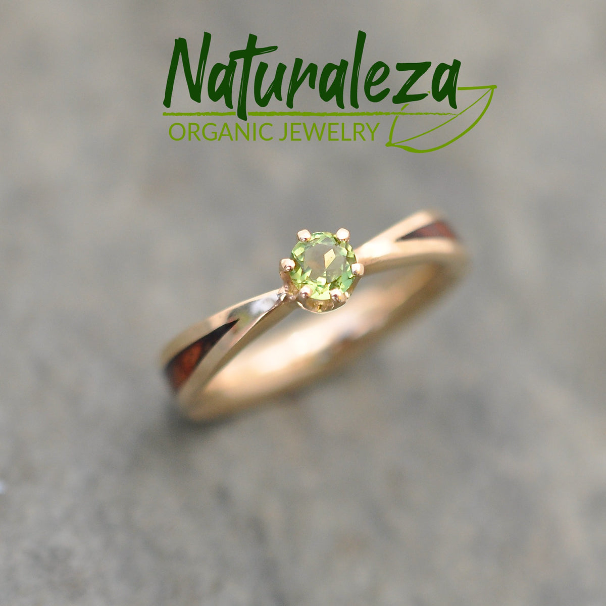 Moldavite solitaire wood engagement ring in yellow gold with wood inlay
