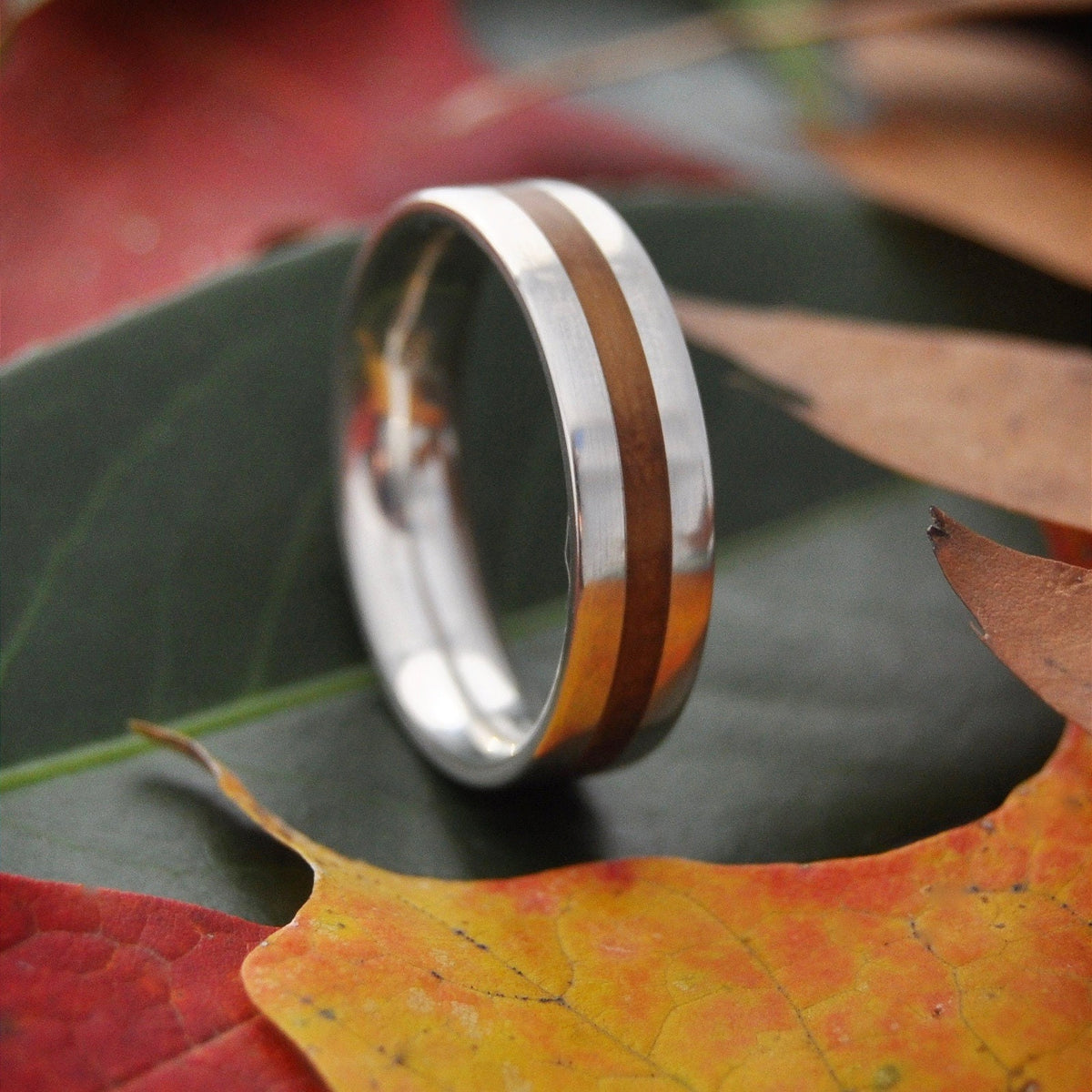 Centro Nacascolo Wood Ring with nacascolo wood inlay and sterling silver edges, handmade in Louisville KY.