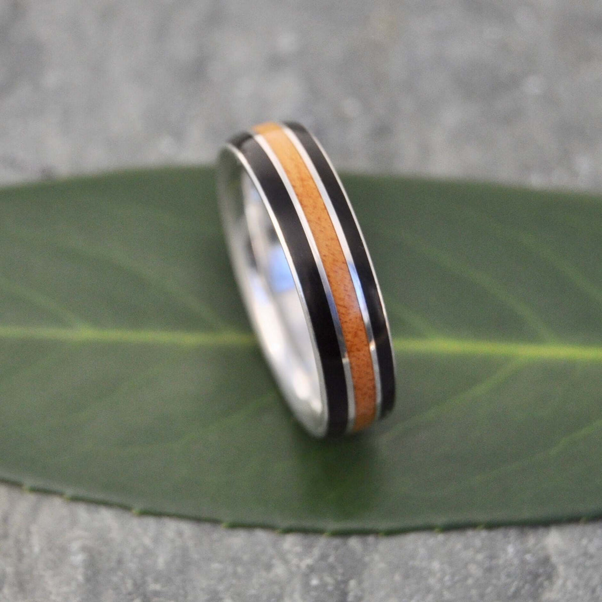 Juntos wood wedding ring with coyol seed, moran wood and sterling silver