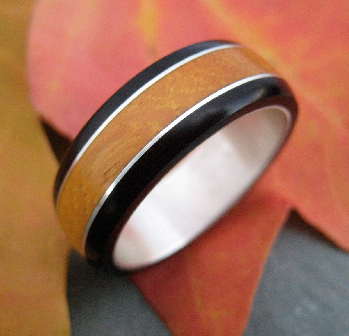 Handmade Juntos wood ring with coyol and moran inlay, Louisville KY