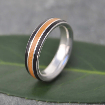 Silver and wood wedding band with black coyol and moran wood, Juntos design