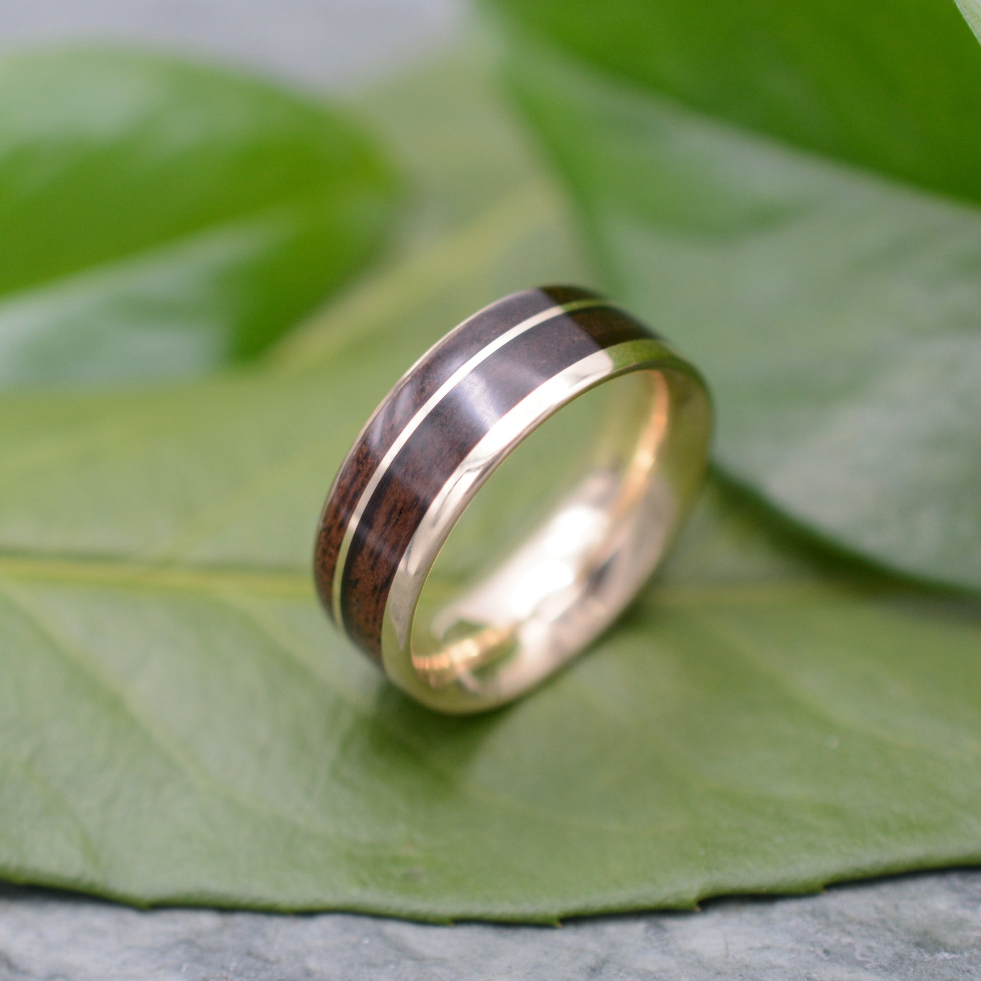 14k recycled gold and walnut wood ring with asymmetric Un Lado Asi design