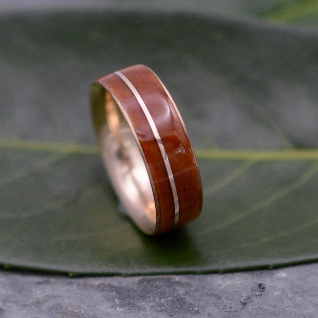 Custom Lignum Vitae wedding band with recycled yellow gold, made to order