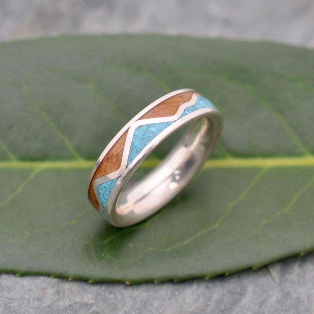 Handcrafted bourbon barrel wood ring with turquoise mountain range inlay