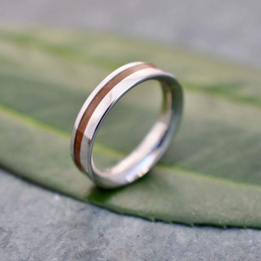 Bourbon barrel white gold ring showing asymmetric Equinox design