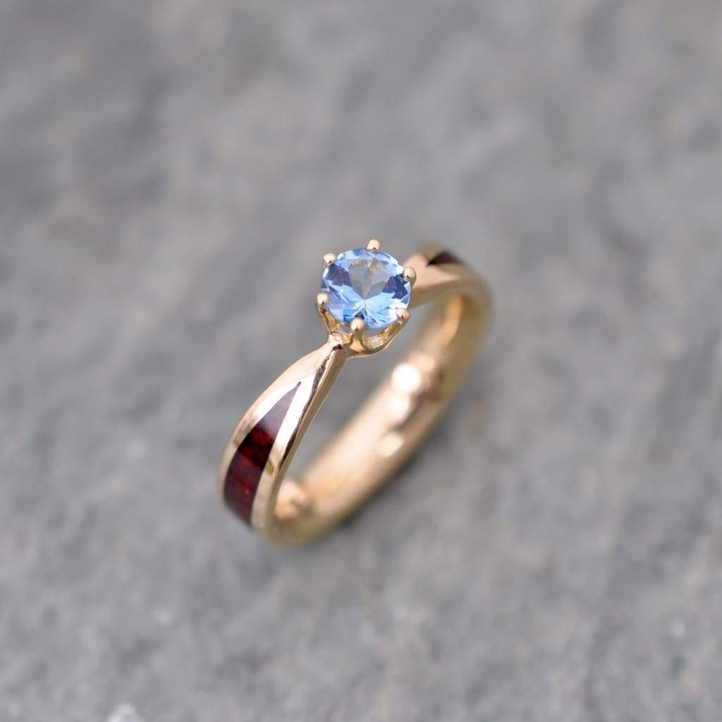 Natural wood grain detail of cocobolo wood on custom wooden engagement ring, unique wooden engagement ring handcrafted with recycled 14k yellow gold