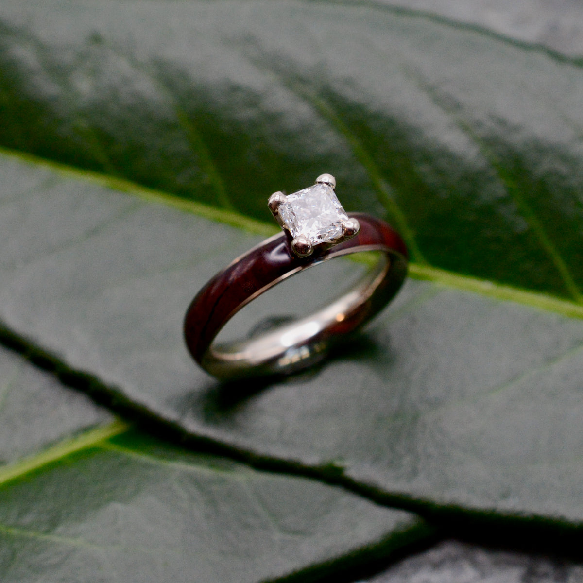 Princess cut diamond wood engagement ring with cocobolo wood band