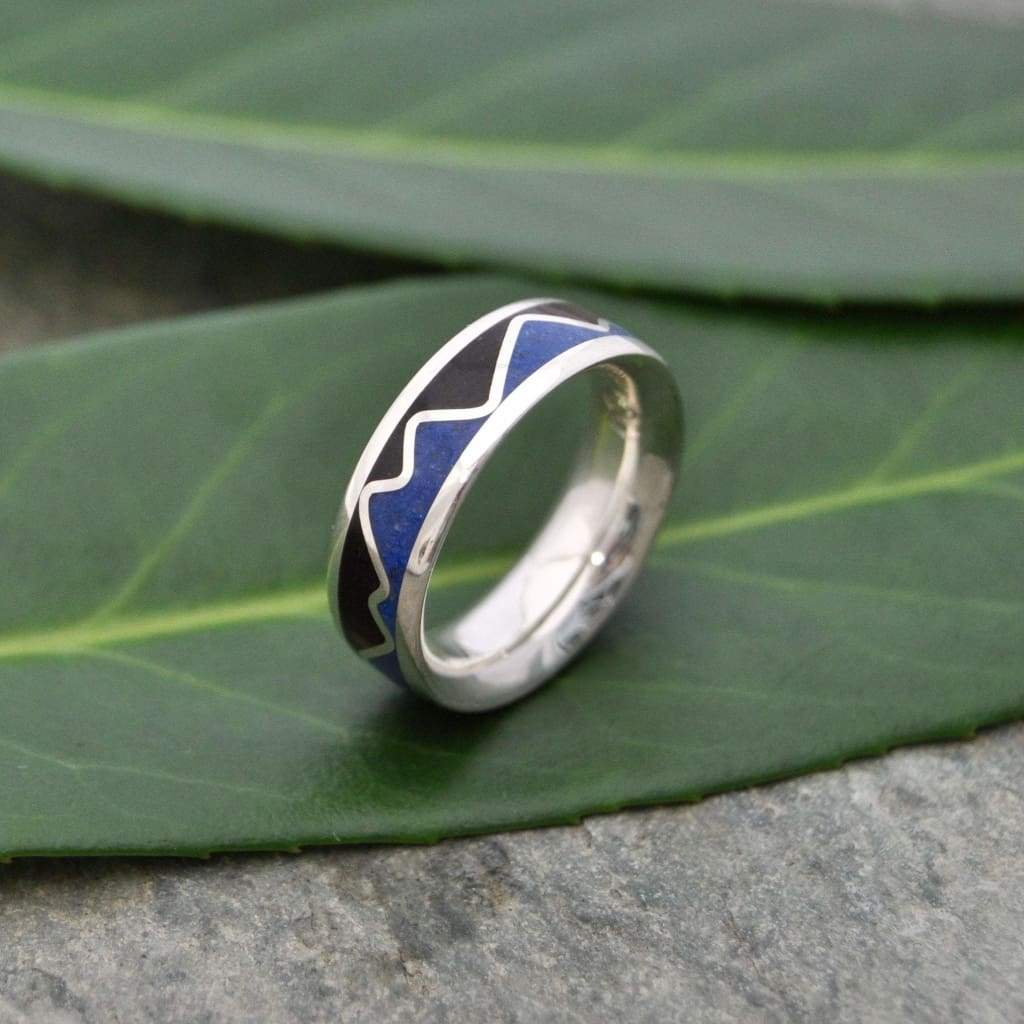 Wood wedding ring with lapis lazuli mountain range pattern detail