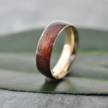 Koa wood wedding ring with recycled yellow gold, handmade in Louisville KY