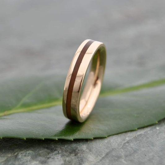 Wood and gold ring with Guayacán Lignum Vitae wood and 14k yellow gold, Equinox design
