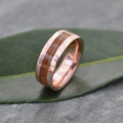 Comfort fit bourbon barrel ring with hammered rose gold edges