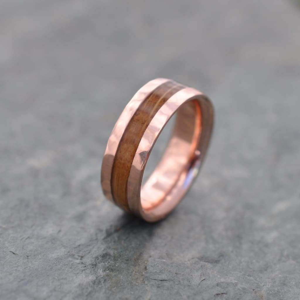 Hammered rose gold bourbon barrel ring with reclaimed white oak wood grain