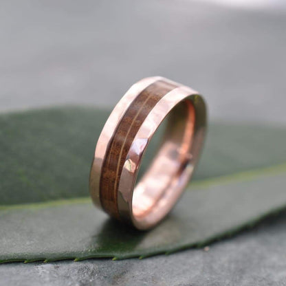 Reclaimed bourbon barrel wedding ring with hand-textured hammered rose gold