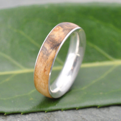 handcrafted cypress burl wood wedding ring with recycled sterling silver
