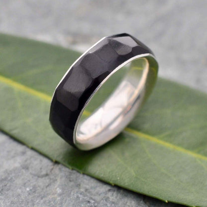 Ethically made coyol wood wedding band with hand-carved texture and silver